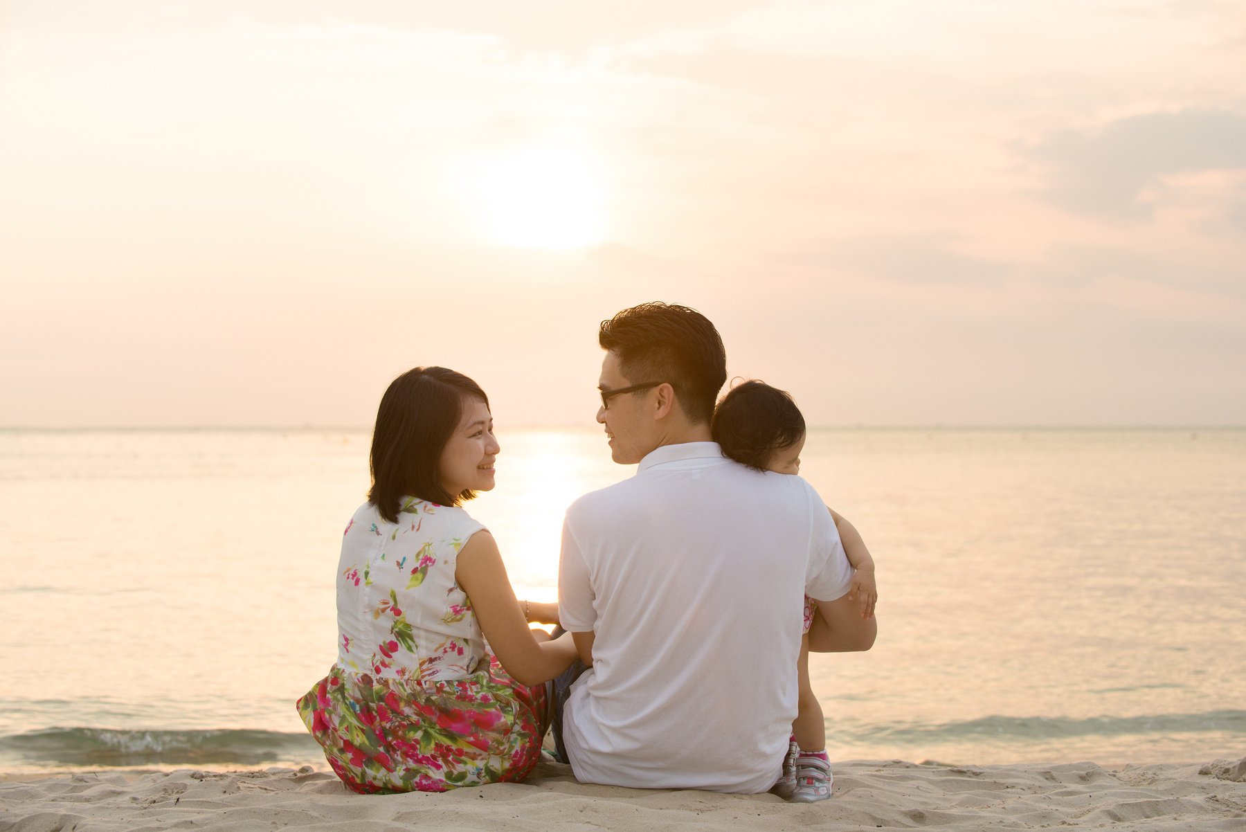 Asian family at outdoor beach